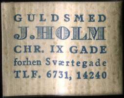 Timbre-monnaie Guldsmed J. Holm - Chr. IX Gade - forhen Svrtegade - Tlf. 6731, 14240 - 1 re sur fond crme - texte bleu (type 2) - Danemark
