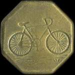 Jeton anonyme de 1 franc en laiton octogonal représentant une bicyclette - avers