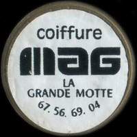 Monnaie publicitaire Coiffure MAG - La Grande Motte - 67.56.69.04 - sur 10 francs Mathieu (imitation de Pile ou Pub)