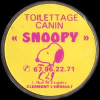 Monnaie publicitaire Toilettage canin � Snoopy � - 67.96.22.71 - 1, Rue St Exup�ry Clermont l�H�rault (jaune) - sur 10 francs Mathieu (imitation de Pile ou Pub)
