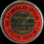 Timbre-monnaie American Optical - Direction Prof. A.Richard - 3 Bd Montmartre - Paris - 5 centimes vert sur fond rouge - avers