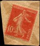 Timbre-monnaie Au Printemps 10 centimes rouge sous pochette