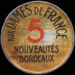 Timbre-monnaie Aux Dames de France - Nouveautés - Bordeaux - 5 centimes vert sur fond doré - avers
