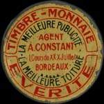 Timbre-monnaie Everite - la meilleure publicité - La meilleure toiture - Agent A.Constant - 5 centimes vert sur fond rouge - avers