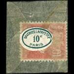 Timbre-monnaie Galeries Lafayette Paris - 10 centimes rouge dans pochette - Etiquette du type 1b blanche et verte 17 x 12 mm environ - avers