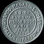 Timbre-monnaie Grands Magasins Jones - 10 centimes rouge sur fond bleu (inscriptions non visibles - avec cercle blanc) - avers