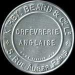 Timbre-monnaie Kirby Beard & Co - Orfèvrerie anglaise - 5, rue Aubert, Paris - 10 centimes rouge sur fond bleu - avers