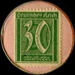 Timbre de 30 pfennig vert sur fond rose