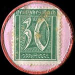Timbre de 30 pfennig vert sur fond&nbsp;rose