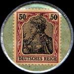 Timbre de 50 pfennig bicolore sur fond vert