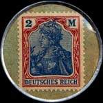 Timbre de 2 mark bordeaux et bleu sur fond vert-marron