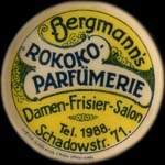Timbre-monnaie Bergmann's Rokoko Parf�merie - 10 pfennig olive sur fond rouge - avers
