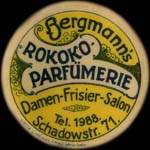 Timbre-monnaie Bergmann's Rokoko Parfümerie - 15 pfennig bleu-vert sur fond rouge - avers