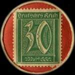 Timbre de 30 pfennig vert sur fond rouge