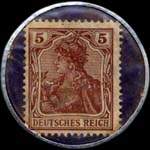Timbre de 5 pfennig brun sur fond bleu-nuit