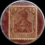 Timbre de 5 pfennig brun sur fond grenat