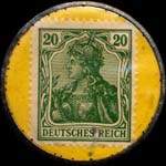 Timbre de 20 pfennig vert sur fond jaune