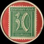 Timbre de 30 pfennig vert sur fond rouge
