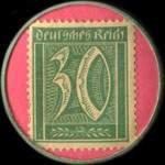 Timbre de 30 pfennig vert sur fond rose
