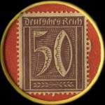Timbre de 50 pfennig violet sur fond rouge