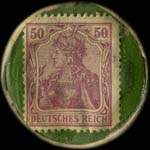 Timbre de 50 pfennig violet sur fond vert