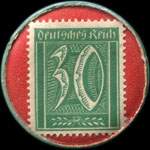 Timbre de 30 pfennig vert sur fond rouge