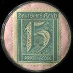 Timbre de 15 pfennig bleu-vert sur fond rose
