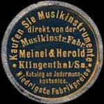 Timbre-monnaie Meinel & Herold - Klingenthal - 10 pfennig olive sur fond rouge - avers