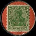 Timbre de 20 pfennig vert sur fond rouge