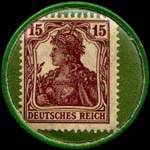 Timbre de 15 pfennig lie-de-vin sur fond vert