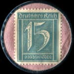 Timbre de 15 pfennig bleu-vert sur fond rose