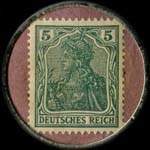 Timbre de 5 pfennig vert sur fond saumon