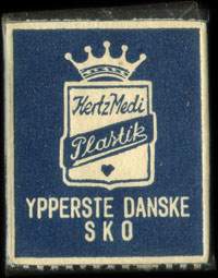 Timbre-monnaie Hertz Medi Plastik - Ypperste Danske Sko - 1 &oslash;re sur fond bleu - Danemark - avers