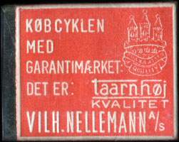Timbre-monnaie Køb cyklen med garantimaerket: - Det er: Taarnhøj kvalitet - Vilh. Nellemann A/S - 1 øre sur fond rouge - Danemark