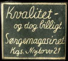 Timbre-monnaie Kvalitat - og dog billigt. S�rgemagasinet Kgs. Nytorv 21 - 1 &oslash;re sur fond noir - Danemark - avers